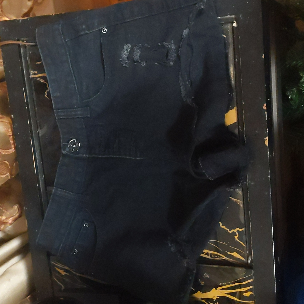 Ripped black shorts
